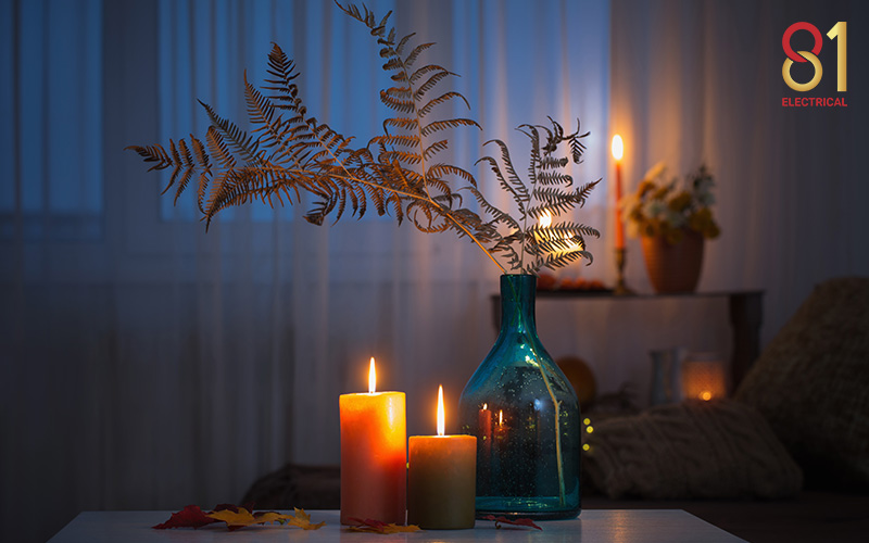 Candles lit up in a dark room due to power failure