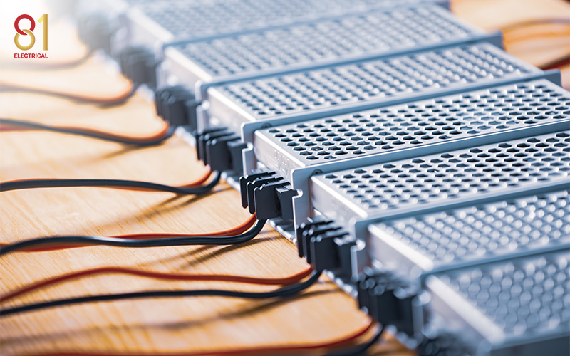 Automation control panel components arranged for assembly.