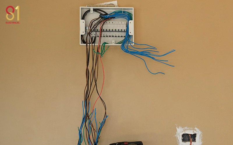Electrical panel and wires installed for Singapore home rewiring.