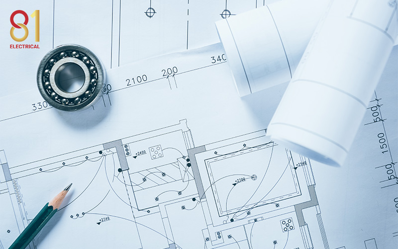 Blueprint for an electrical floor plan with a pencil.