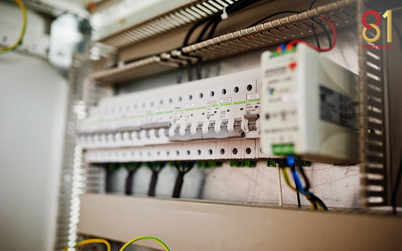 Electrical circuit breakers in a distribution board.