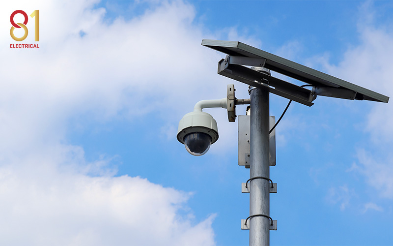 A CCTV camera powered by a solar panel.