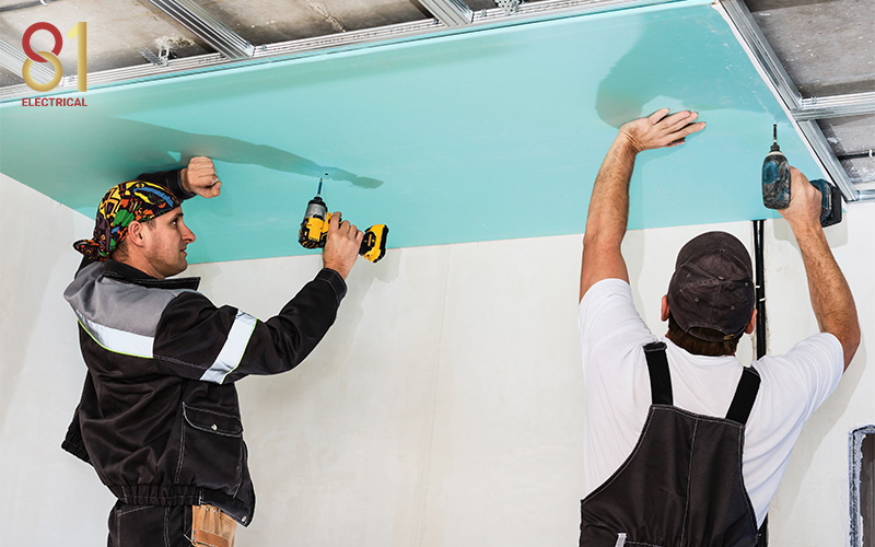 False ceiling being installed to hide electrical wires