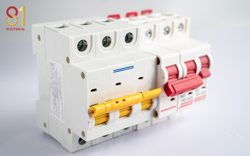 Multiple pole circuit breaker on a white background.