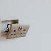 Fallen light switch with exposed wires