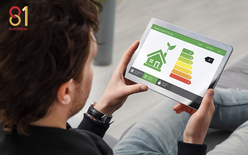 Man checking smart home energy usage on a tablet.