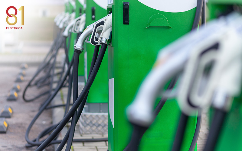 Several EV charging stations in a carpark.